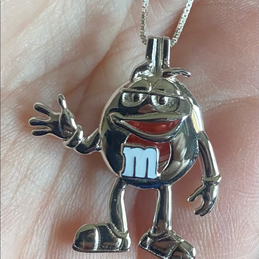 M & Ms mascot necklace, all in sterling silver.